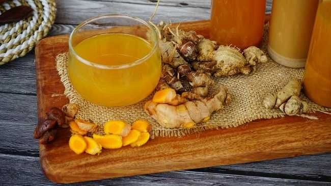 Jamu Kunyit Asam Redakan Nyeri Haid: 5 Manfaat Unggulnya!